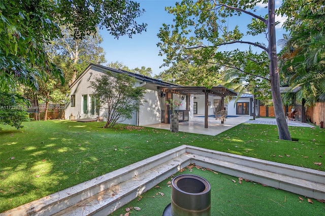 1511 SW 30th Pl, Fort Lauderdale, FL 33315 - back of house featuring a pergola, a fenced backyard, a patio area, and stucco siding