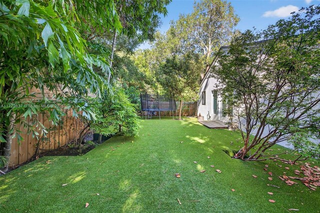 1511 SW 30th Pl, Fort Lauderdale, FL 33315 - view of yard with a trampoline