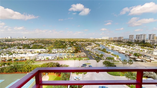 balcony featuring a water view