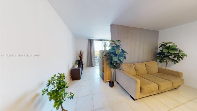 living room with floor to ceiling windows