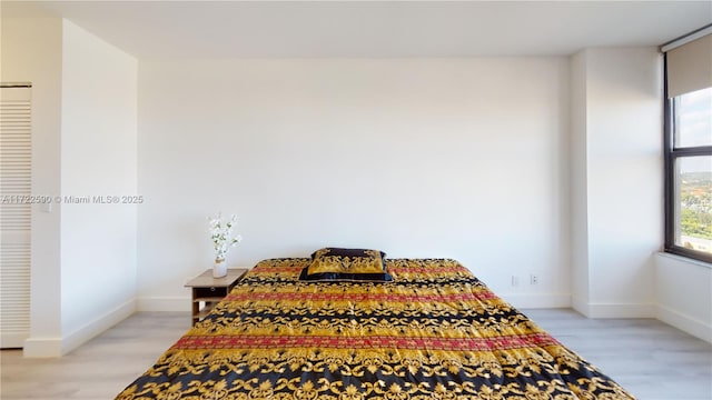 bedroom featuring light wood-type flooring