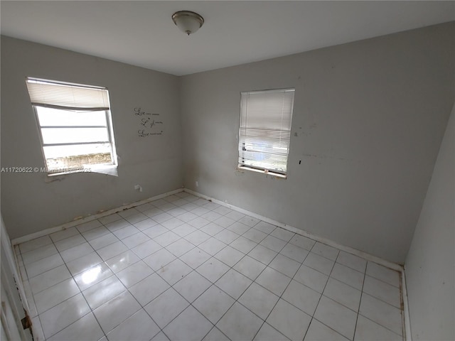 view of tiled spare room