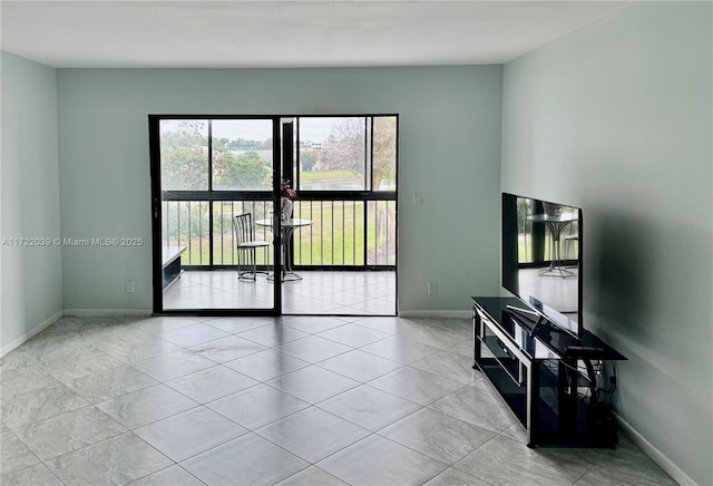 living room with light tile patterned floors