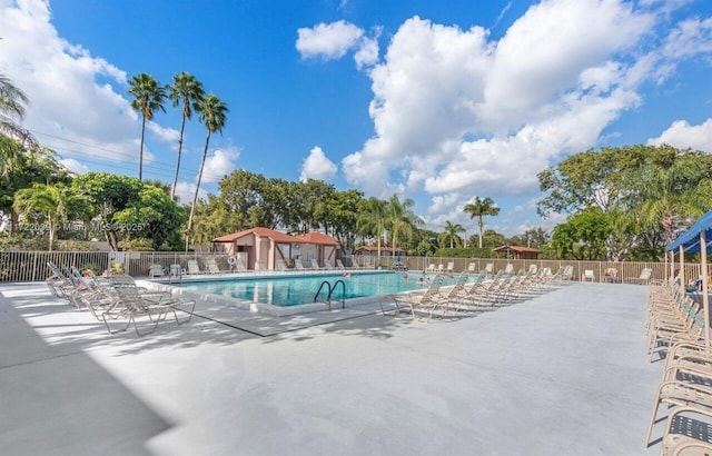 view of swimming pool featuring a patio area