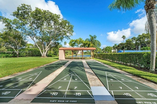 surrounding community featuring a gazebo and a yard