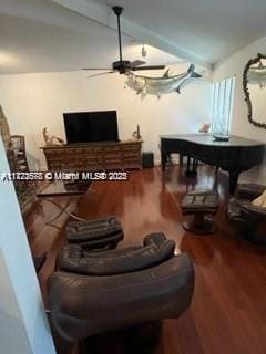 living room with hardwood / wood-style floors and ceiling fan