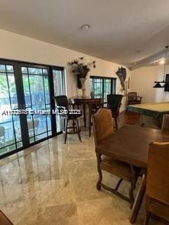 dining area featuring french doors