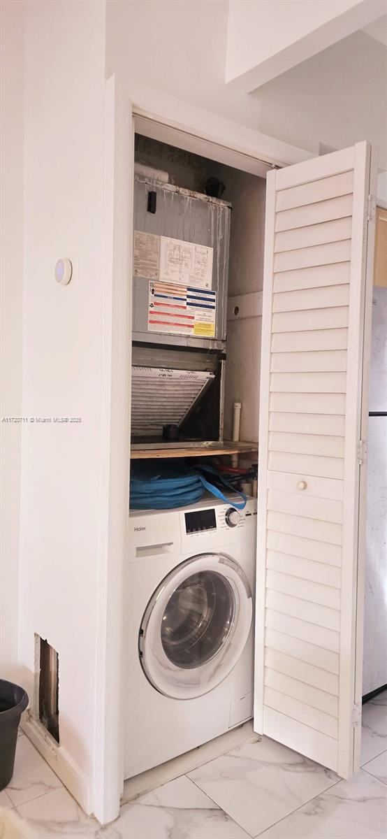 laundry room featuring washer / clothes dryer