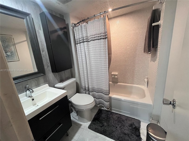 full bathroom with vanity, toilet, tile patterned flooring, and shower / bath combo with shower curtain