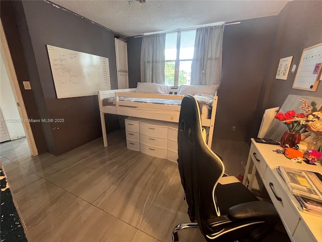 office space featuring a textured ceiling