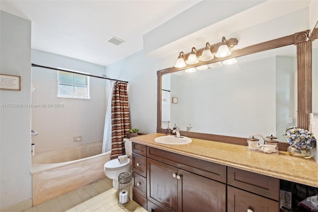 full bathroom featuring vanity, toilet, tile patterned flooring, and shower / bath combo with shower curtain