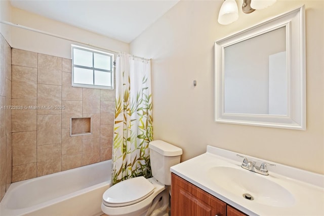 full bathroom with shower / tub combo with curtain, vanity, and toilet