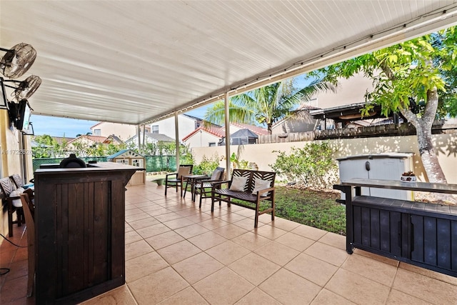 view of patio / terrace featuring an outdoor bar