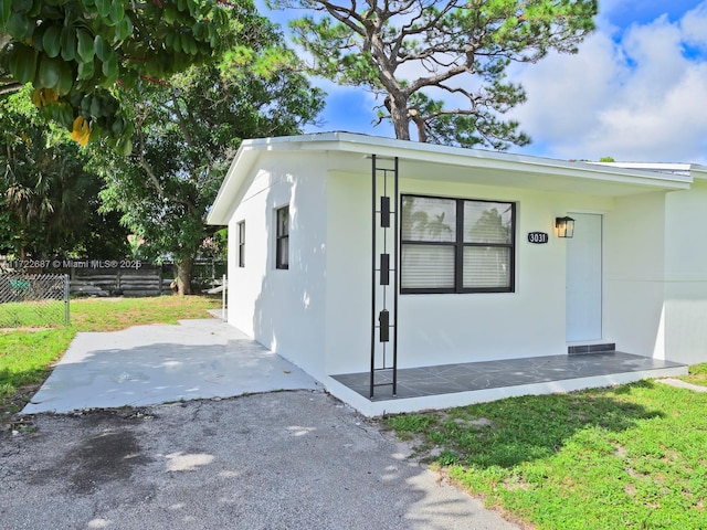 exterior space with a lawn