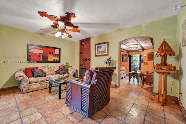 living room featuring ceiling fan