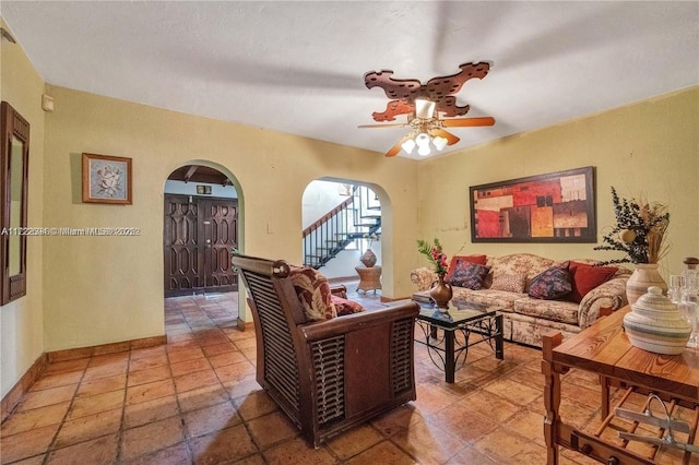 living room featuring ceiling fan