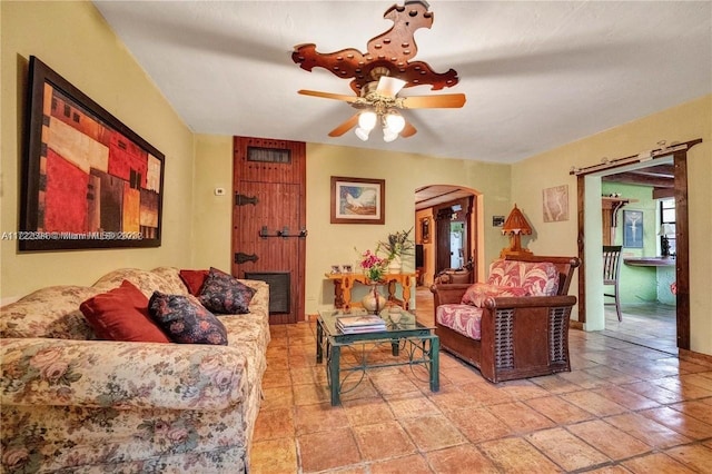 living room with ceiling fan