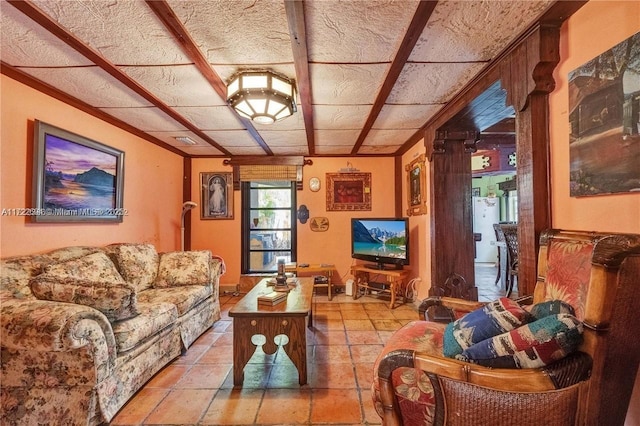 living room featuring crown molding