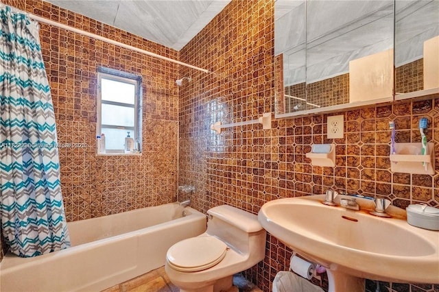 full bathroom with tile patterned flooring, toilet, tile walls, and sink