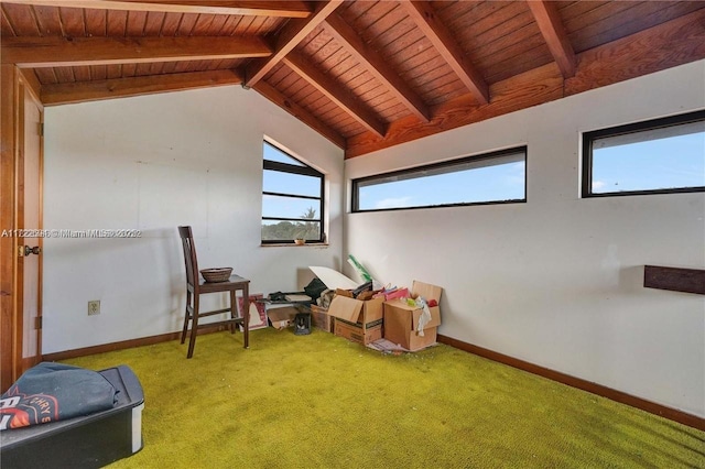 interior space featuring vaulted ceiling with beams, carpet floors, and wooden ceiling