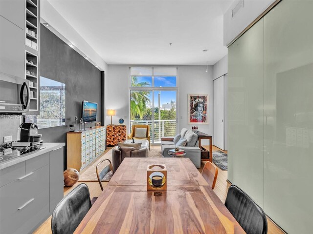 dining space featuring light hardwood / wood-style flooring