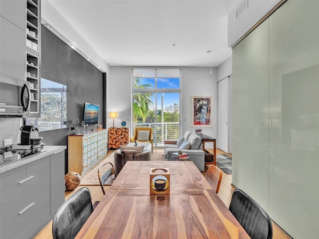 dining room featuring expansive windows