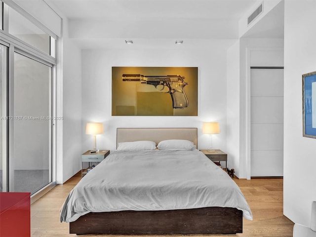 bedroom featuring light hardwood / wood-style flooring