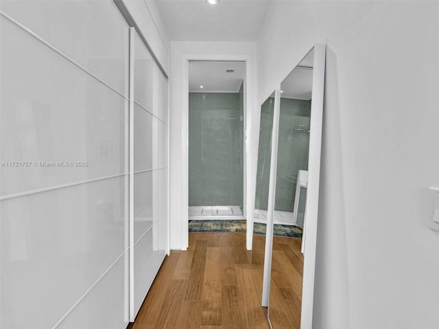 hallway featuring hardwood / wood-style floors