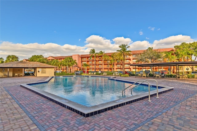 view of swimming pool featuring a patio