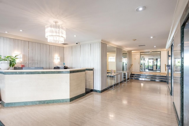 1408 Brickell Bay Dr Unit 1116, Miami, FL 33131 - welcome area featuring a chandelier, recessed lighting, crown molding, and a surveillance system
