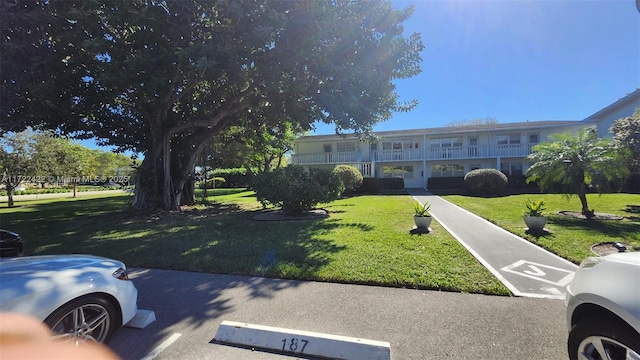 view of front of home featuring a front lawn