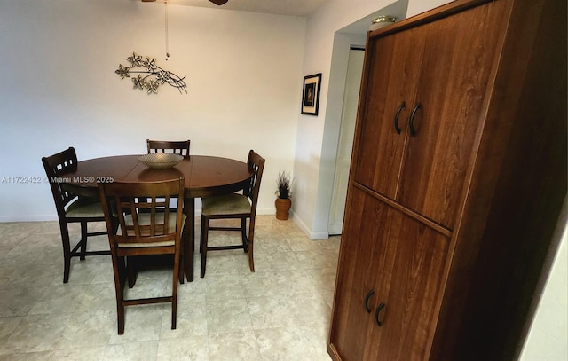 dining area featuring ceiling fan