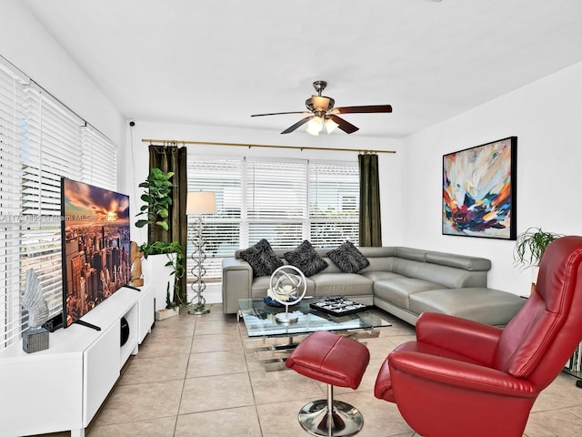 tiled living room featuring ceiling fan