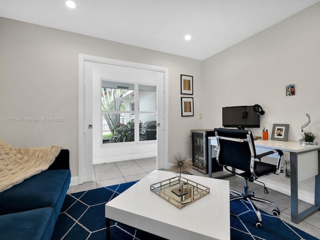 office area with tile patterned floors