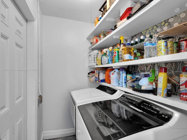 laundry room with washing machine and dryer