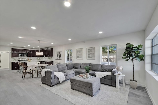 living room with light hardwood / wood-style floors