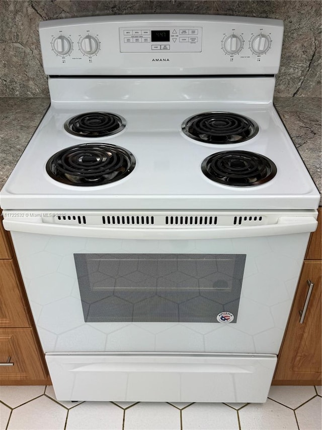 room details with white range with electric stovetop