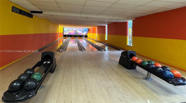 playroom featuring bowling and light wood-type flooring