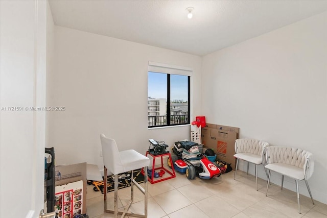 living area with light tile patterned flooring