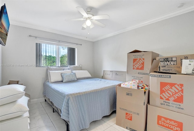 tiled bedroom featuring ceiling fan and ornamental molding