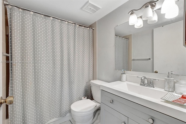 bathroom featuring tile patterned floors, vanity, toilet, and a shower with curtain