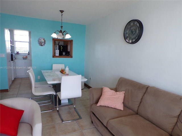 3010 Marcos Dr Unit R412, Aventura, FL 33160 - dining space featuring light tile patterned floors and a chandelier