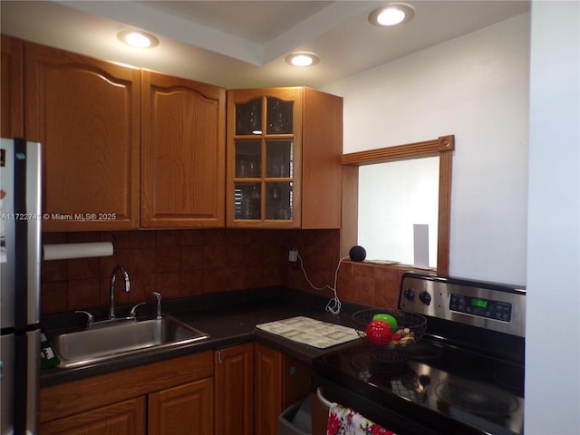 3010 Marcos Dr Unit R412, Aventura, FL 33160 - kitchen featuring a sink, stainless steel appliances, glass insert cabinets, dark countertops, and tasteful backsplash