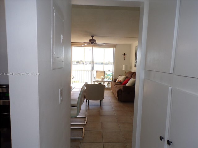 interior space featuring ceiling fan