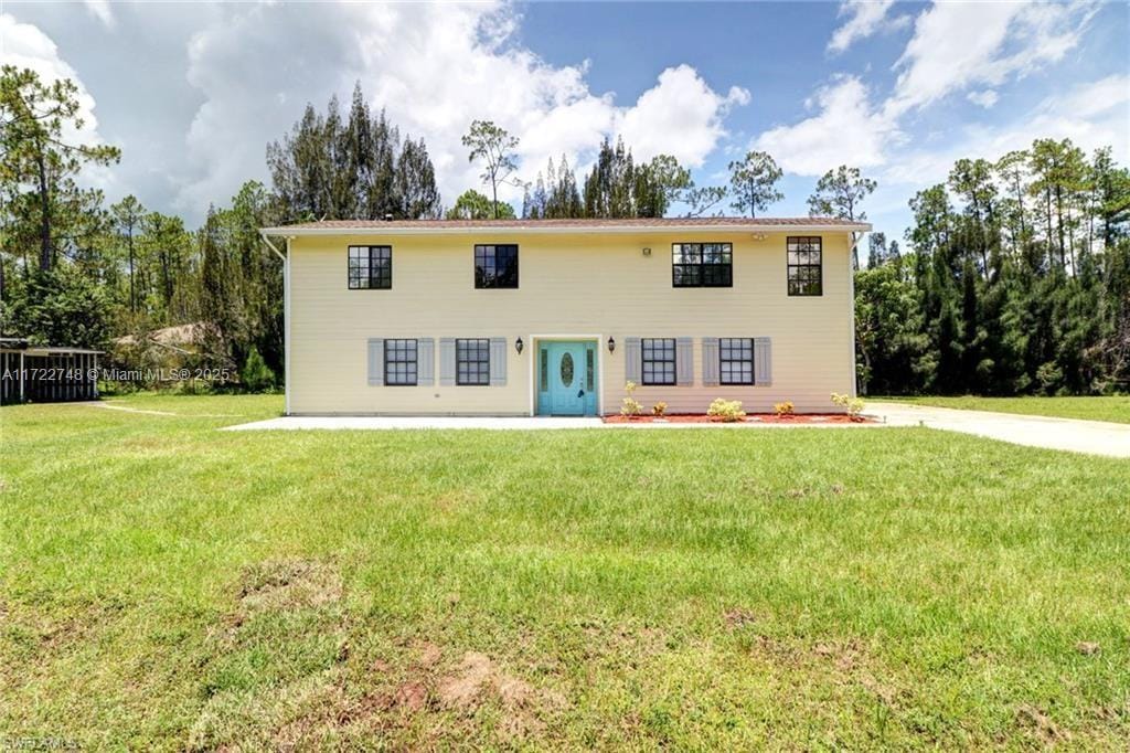 view of front of property with a front yard