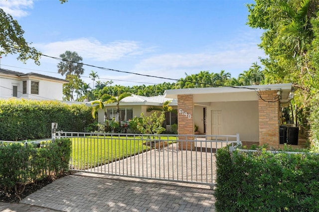 view of front of house with a front lawn