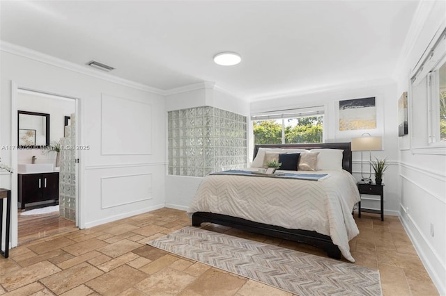 bedroom with ornamental molding