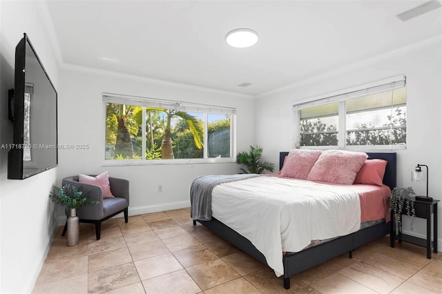 bedroom with light tile patterned floors, multiple windows, and ornamental molding