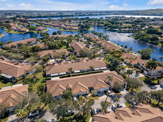 aerial view with a residential view and a water view