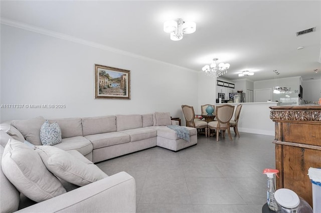 tiled living room featuring baseboards, visible vents, a chandelier, and crown molding